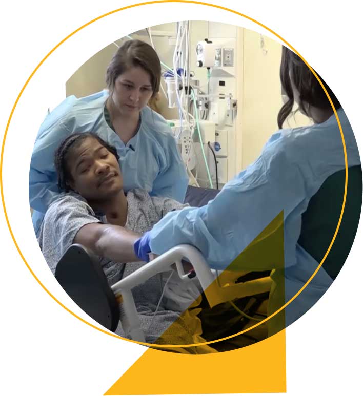 Healthcare professionals caring for brain injured patient at Shenandoah children's hospital